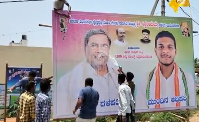 Milk anointing for Siddaramaiah's photo in Siddaramahundi