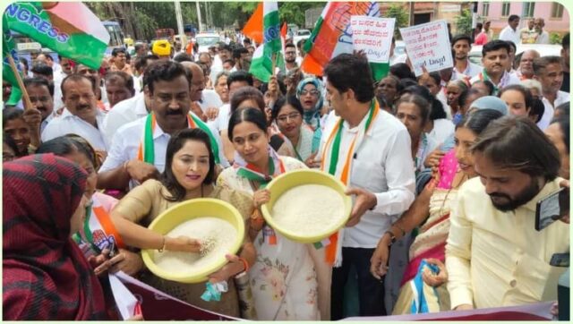 Minister Lakshmi Hebbalkar protested against Center in an innovative way by holding a rice basket
