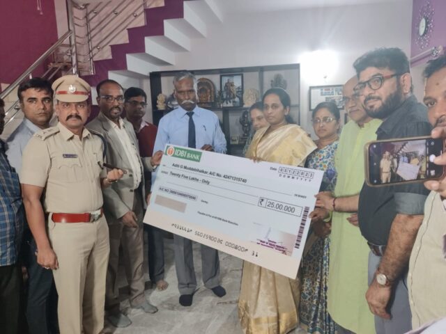 Bengaluru Urban Deputy Commissioner Dayanand handed over a compensation check of Rs 50 lakh to family of Martyr Pranjal