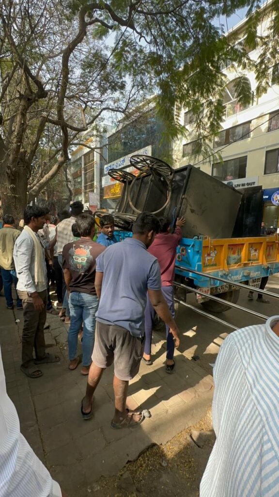 Footpath encroachment clearance operation on Jyoti Nivas College Road in Koramangala
