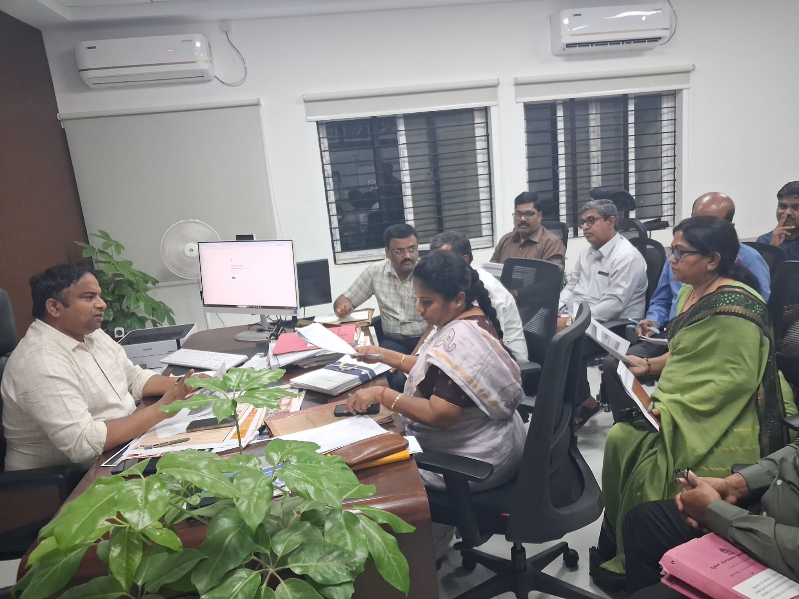 Meeting in an office setting.