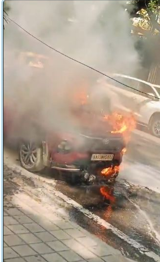 ಬೆಂಗಳೂರಿನ ಕನ್ನಿಂಗ್‌ಹ್ಯಾಮ್ ರಸ್ತೆಯಲ್ಲಿ ಕಾರಿಗೆ ಬೆಂಕಿ: ಸಮಯಕ್ಕೆ ಹೊರಬಂದ ಚಾಲಕ